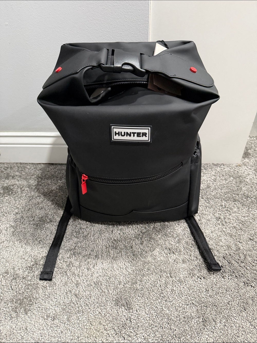 Hunter Black Roll-Top Backpack with Red Accents